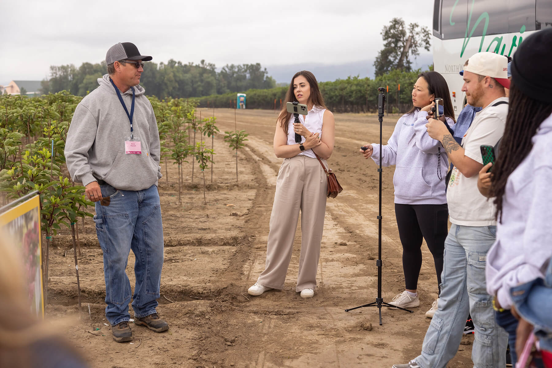 Talking to the creators in the hydrangea trees field.